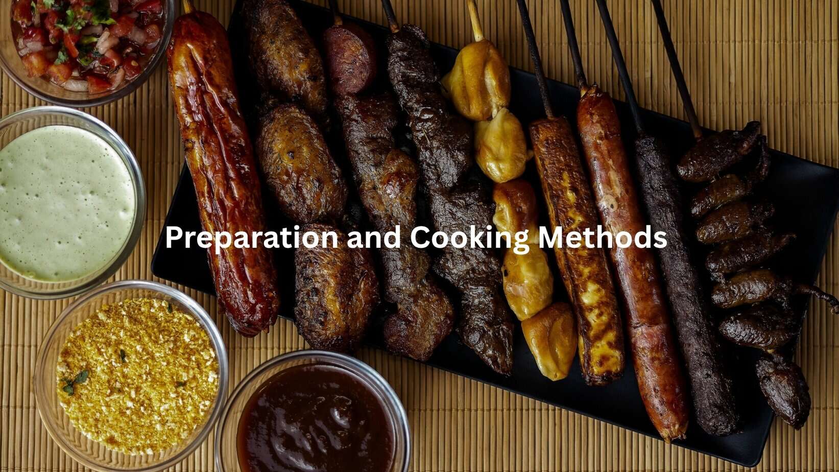 A platter of grilled chicken sausage kabobs, various meat skewers, and dipping sauces on a bamboo mat.