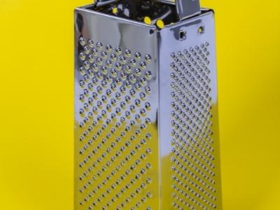 What is a cheese grater used for
