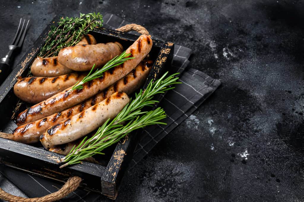 Sausages with rosemary and seasoning.