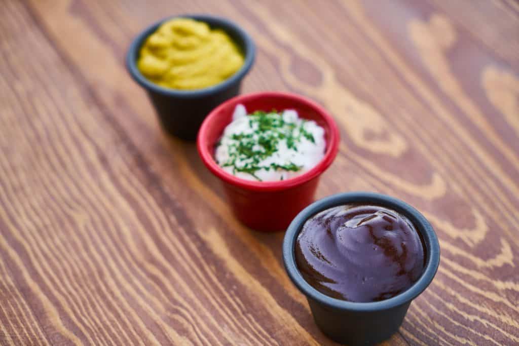Cook The Restaurant's Food at Home 32 Close-up of creamy, tangy, and smoky sauces ready to elevate your chicken sausage platter with easy homemade dip ideas. Credits: pexels.com (Photo by Engin Akyurt)
