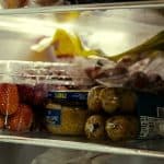 Well-organized fridge featuring chicken sausages, inviting to consider: how long can chicken sausage be in the fridge?