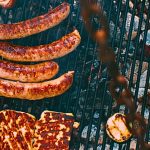 Grilled chicken sausages alongside zucchini and cheese, highlighting versatile chicken sausage uses in outdoor cooking. Credit: unsplash.com (photo by Markus Spiske)