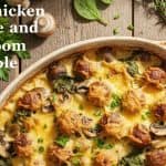 A hearty chicken sausage and mushroom casserole dish, served on a rustic wooden table with fresh herbs.